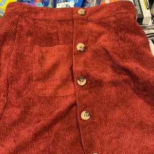 Shien skirt. Red orangeish color M.